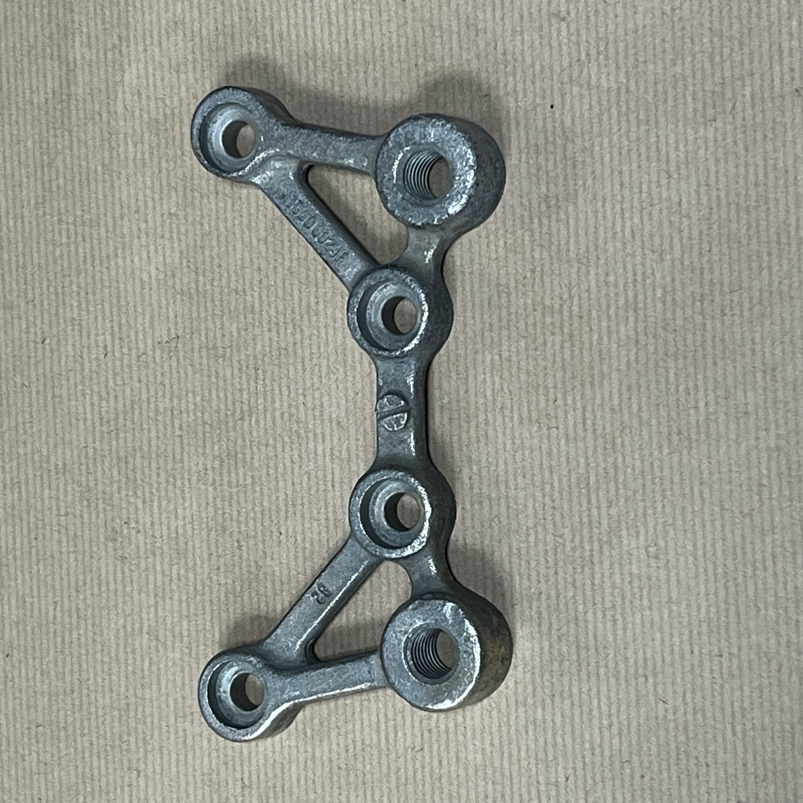 Lotus Elan M100 Rear Caliper Mounting Bracket - Refurbished